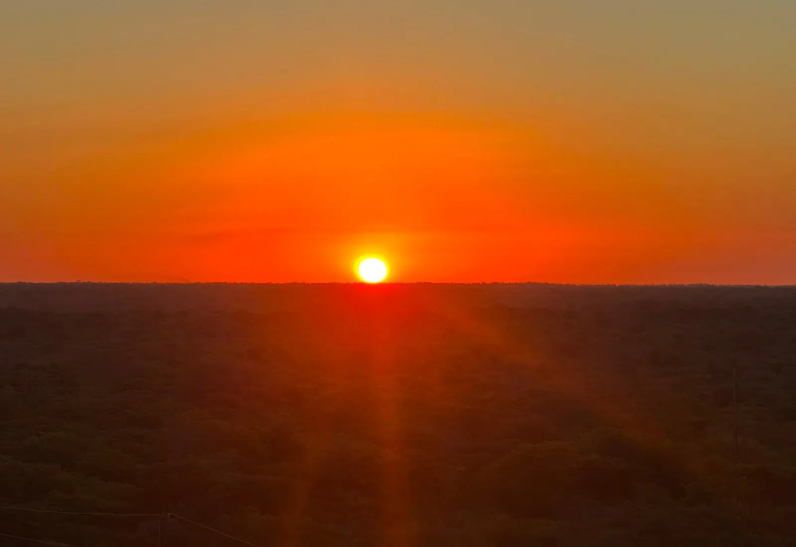 O pôr do sol sobre as Dunas Vermelhas